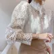 Vintage-Solid-White-Lace-Blouse-Shirts-Women-New-Korean-Button-Loose-Shirt-Tops-Female-Hollow-CasualnKnHHgOY.webp